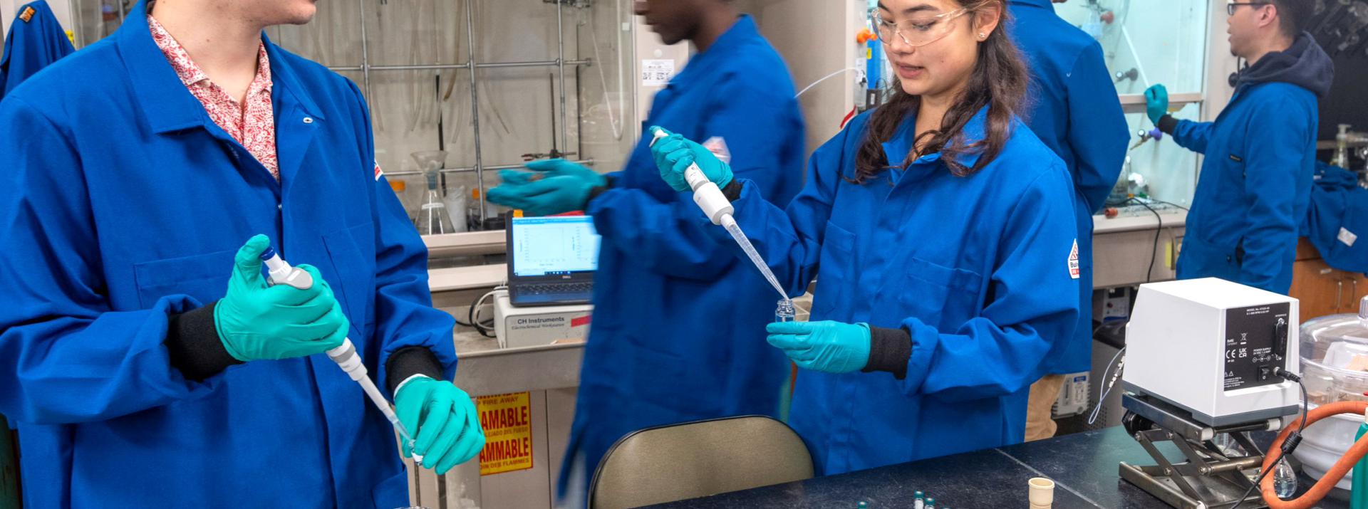 Researchers working in a green chemistry laboratory